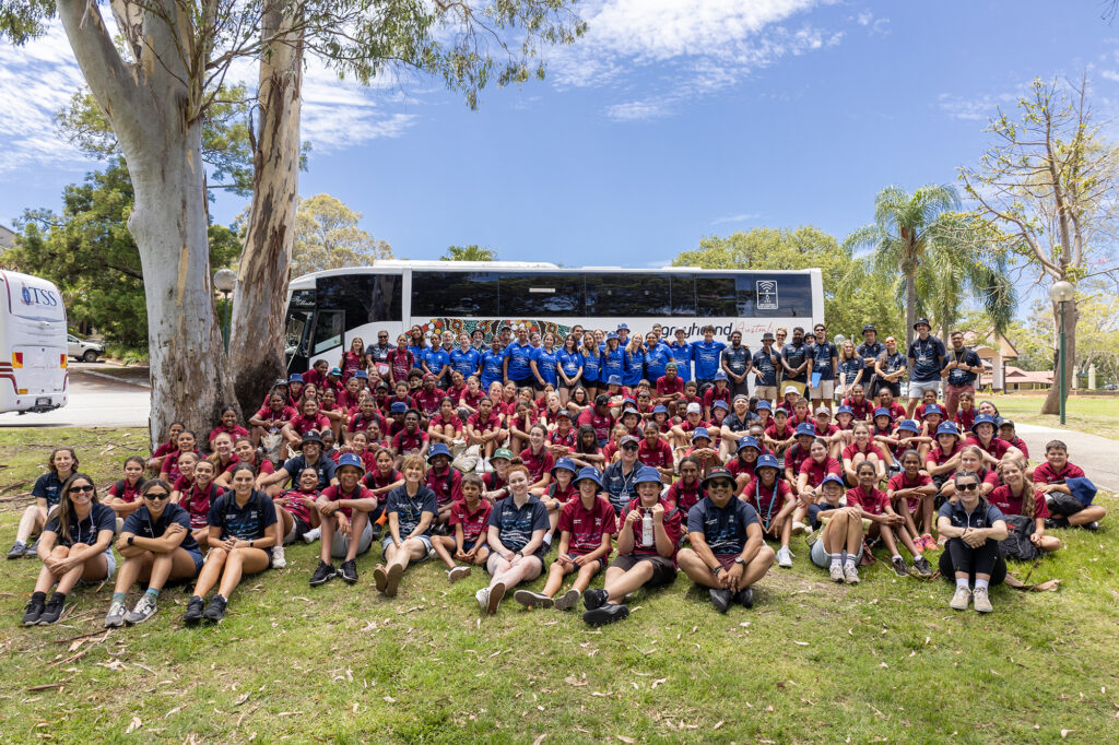 group photo in front of Greyhound Coach